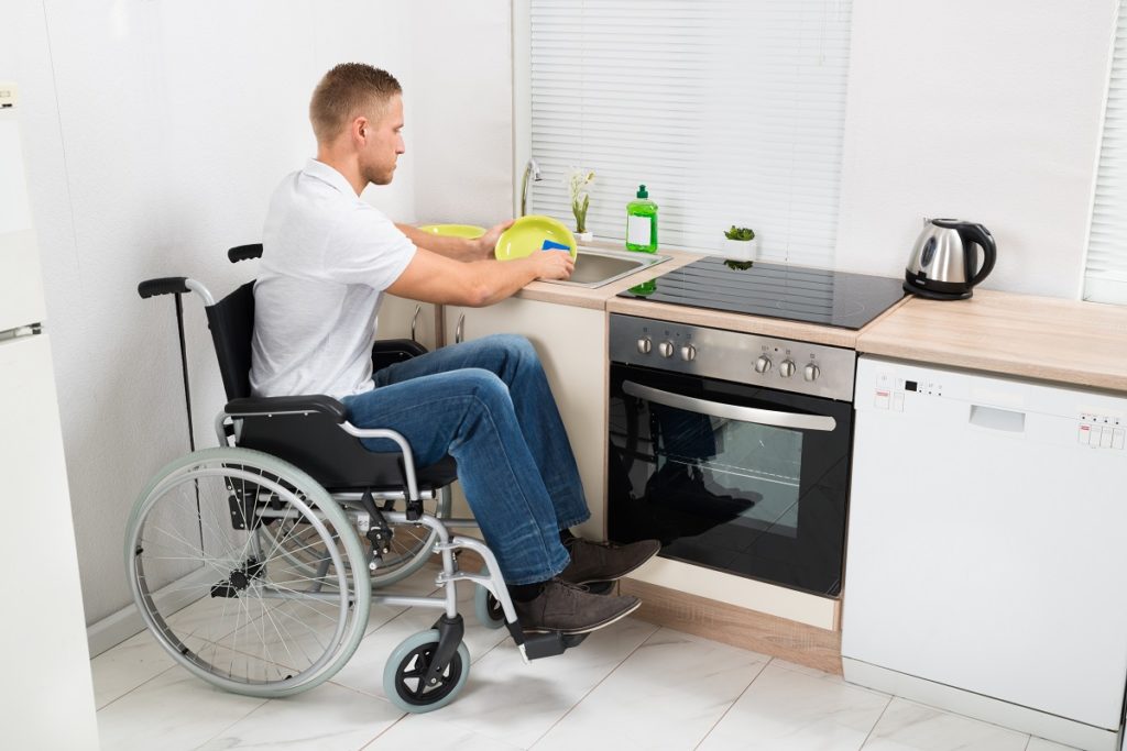 Person with disability doing the dishes