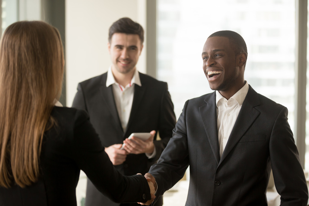 businesspeople shaking hands