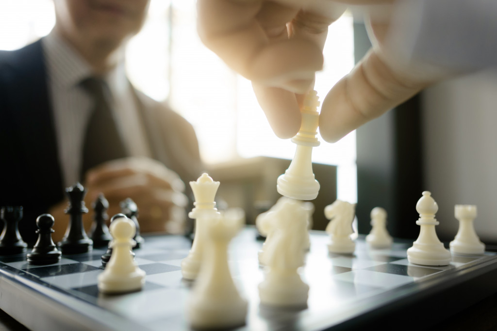 Two employees playing chess