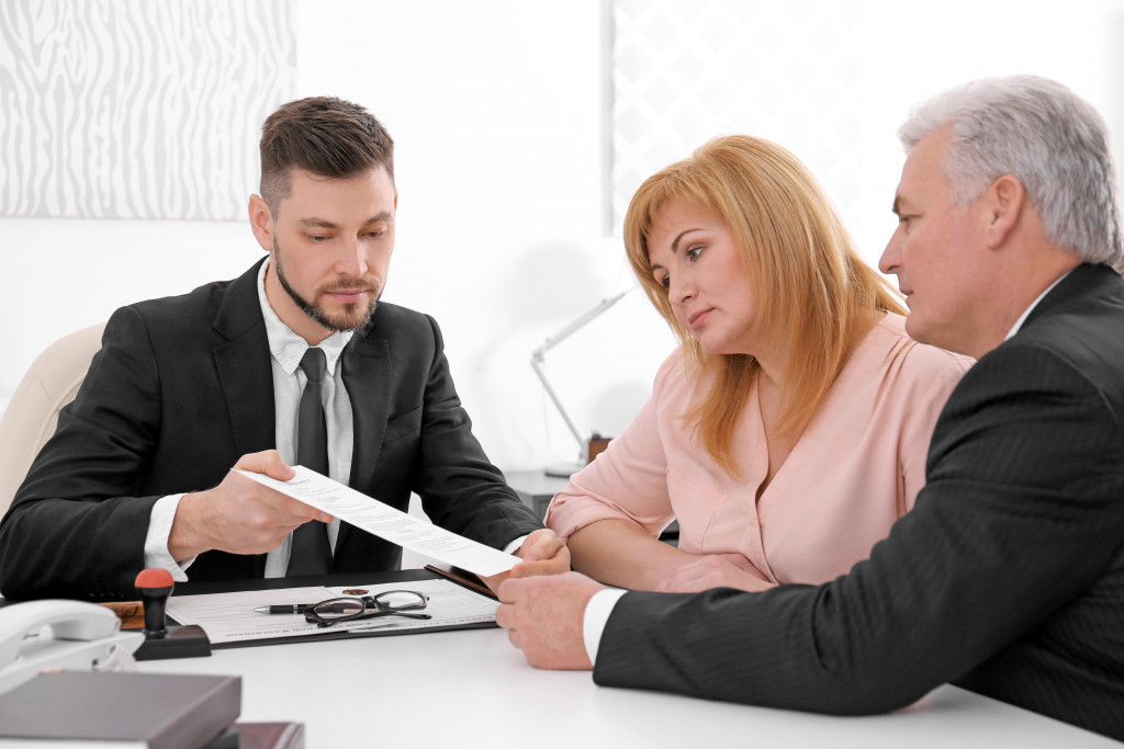 Lawyer and business owner discussing inheritance laws