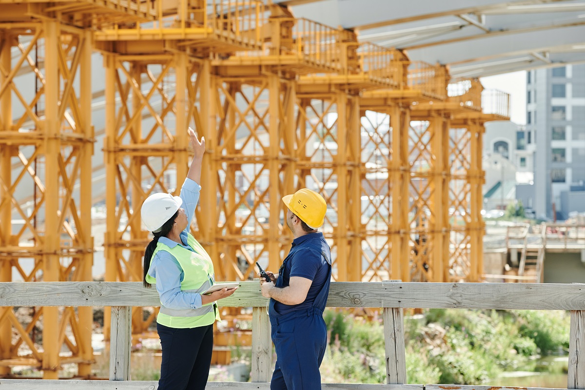 Two Construction people discussing