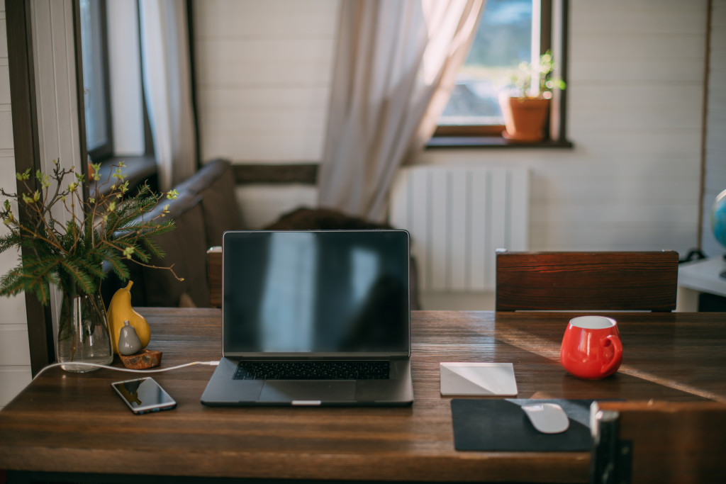 A home office with a laptop