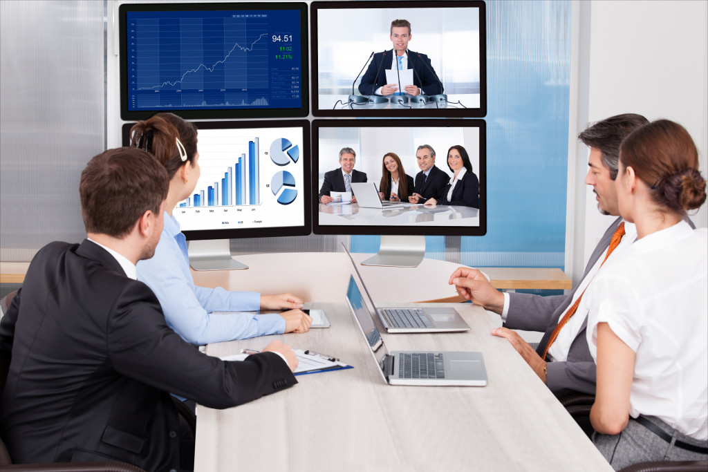 A group of businesspeople on a video conference